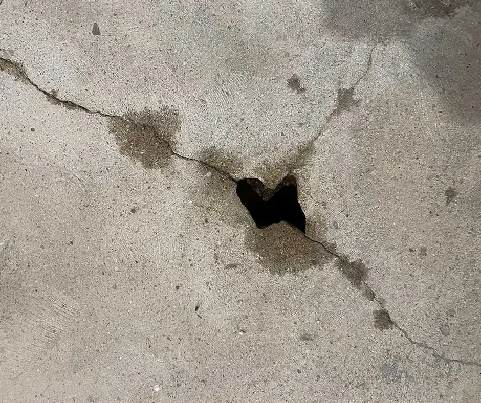 Close-up of a concrete floor Basement Crack Repair Rochester, NY Close-up of a concrete floor Basement Crack Repair Rochester, NY