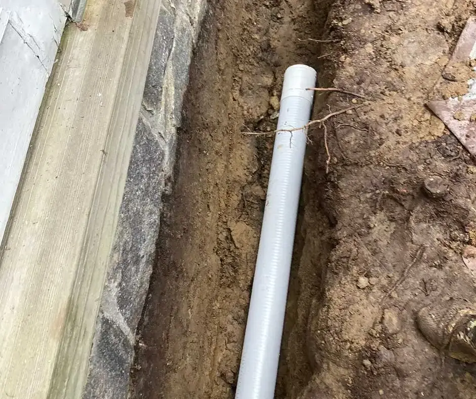 Long PVC pipe French Drain Installation Rochester, NY Long PVC pipe French Drain Installation Rochester, NY