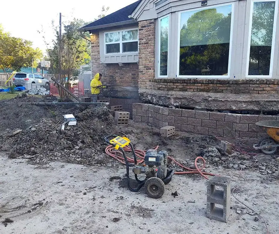 Workers rebuilding Foundation Repair Rochester, NY Workers rebuilding Foundation Repair Rochester, NY